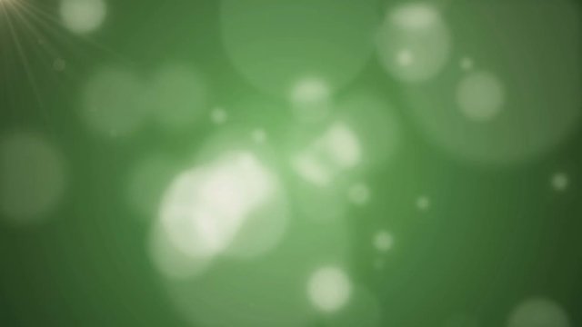 Blured bokeh on a green background