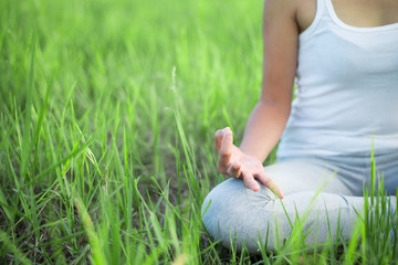 Yoga woman In the lotus posture.