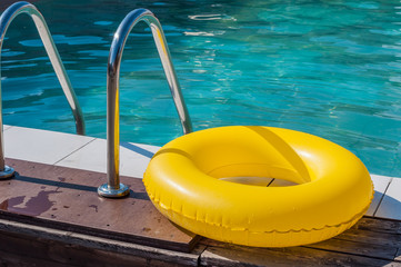 Inflatable circle lies on the edge of the pool