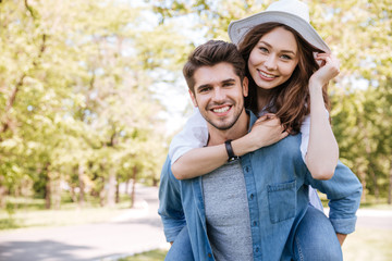 Portrait of a happy young couple having fun outdoors