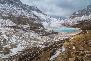 Chinese tourist visiting autumn forest in Yading national level