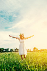 Freedom concept : Young beautiful woman enjoying with fresh air