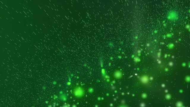Abstract animation of moving green glowing spheres and particles