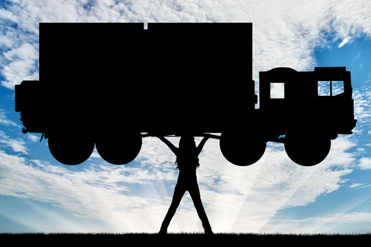 Silhouette of strong feminist, lifting trucks