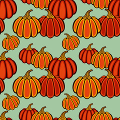 Seamless pattern with pumpkins. Vector clip art.
