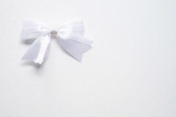 white ribbon on white background