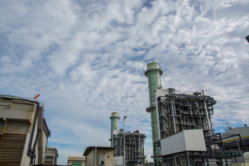 Fototapeta premium view of pipelines and towers, heavy industry.