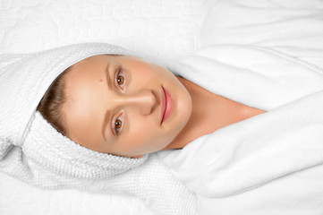 Fototapeta na wymiar Spa skin care beauty woman wearing hair towel