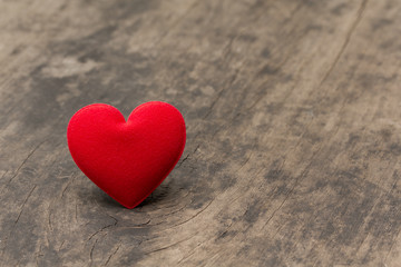 red heart fabric on table