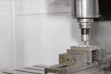 High precision CNC machining center working, cutting die metal m