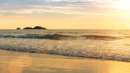 Sea surf during sunset in the Gulf of Thailand.