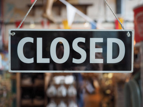 Closed sign on a shop window