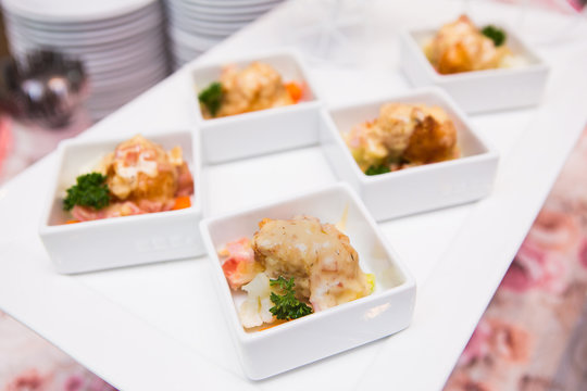 catering food in white plate  on table