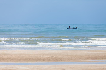 Fototapeta na wymiar Fishermen Fishing, Small fisherman boats along the shoreline.