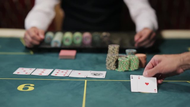 The dealer moves the winning player