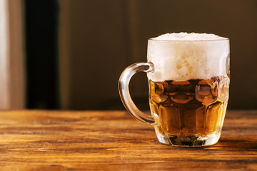 Beer mug full of cold fresh alcohol drink