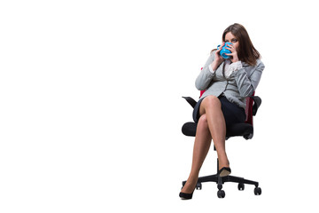 Businesswoman sitting isolated on white background
