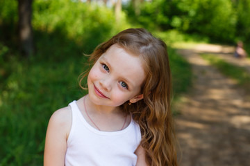 portrait of a beautiful young girl with long hair