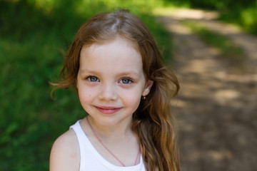portrait of a beautiful young girl with long hair