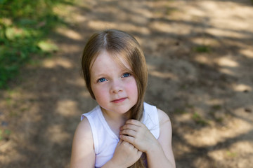 portrait of a beautiful young girl with long hair