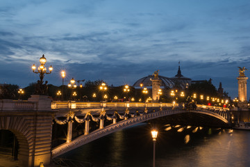 Pont Alexander III bridge at dusk in Paris, France