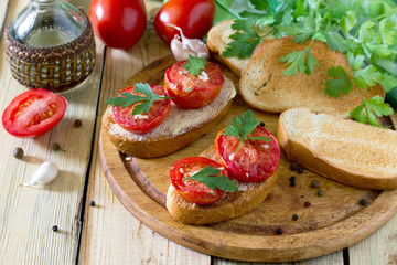 Italian tomato bruschetta with sun dried tomatoes, herbs and but