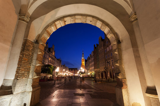 Main Town Hall in Gdansk, Poland seen from under an arch in the old town 