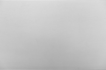The line texture of the white shutter door of the factory building