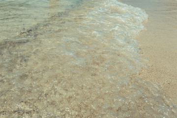 wave of the sea on sand beach