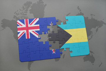 puzzle with the national flag of new zealand and canada on a world map background. 3D illustration