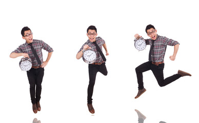 Young man with clock isolated on white