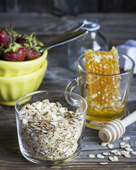 Cereals,fruit,milk and honey for breakfast