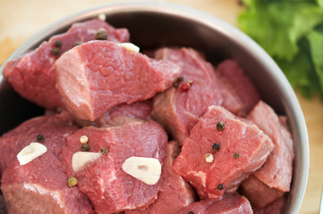 pieces of meat with pepper and garlic