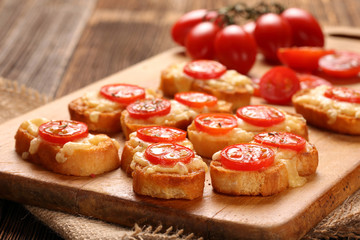 Grilled toast with cheese and tomatoes