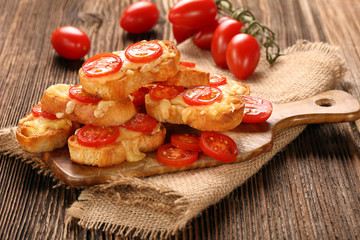 Grilled toast with cheese and tomatoes