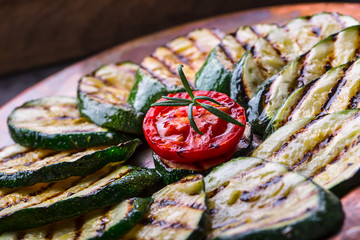 Grilled Zucchini Tomato with chili pepper.  Italian mediterranean or greek cuisine. Vegan vegetarian  food.