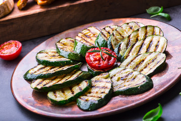 Grilled Zucchini Tomato with chili pepper.  Italian mediterranean or greek cuisine. Vegan vegetarian  food.