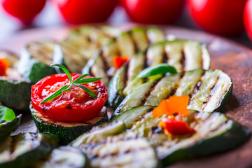 Grilled Zucchini Tomato with chili pepper.  Italian mediterranean or greek cuisine. Vegan vegetarian  food.