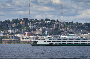 Seattle Skyline. A summertime view of the Seattle skyline looking from west Seattle across Elliott...