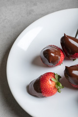 Juicy strawberry with milk chocolate