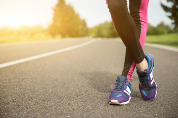 Young woman resting after running