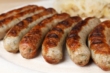 Authentic sausages from Nuremberg Bavaria with Sauerkraut and Roll