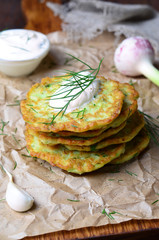 Zucchini Fritters on rustic background