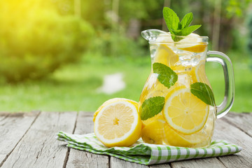 Fototapeta Lemonade with lemon, mint and ice obraz