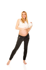 Happy pregnant woman looking at camera
