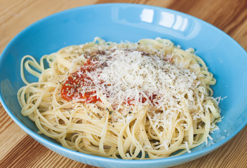 Pasta with tomato sauce and cheese.