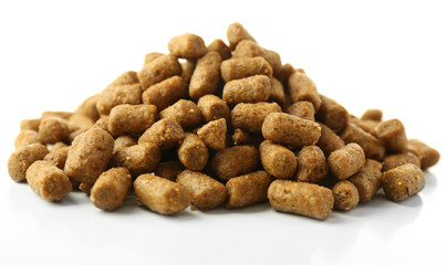 Fototapeta na wymiar Pile of dog food isolated on white