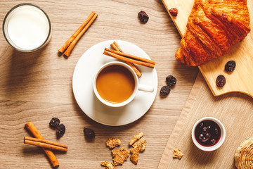 breakfast at home on wooden table with cup of coffee