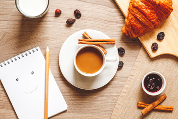 breakfast at home on wooden table with cup of coffee