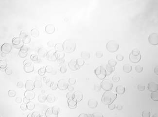 Soap bubbles on sky background